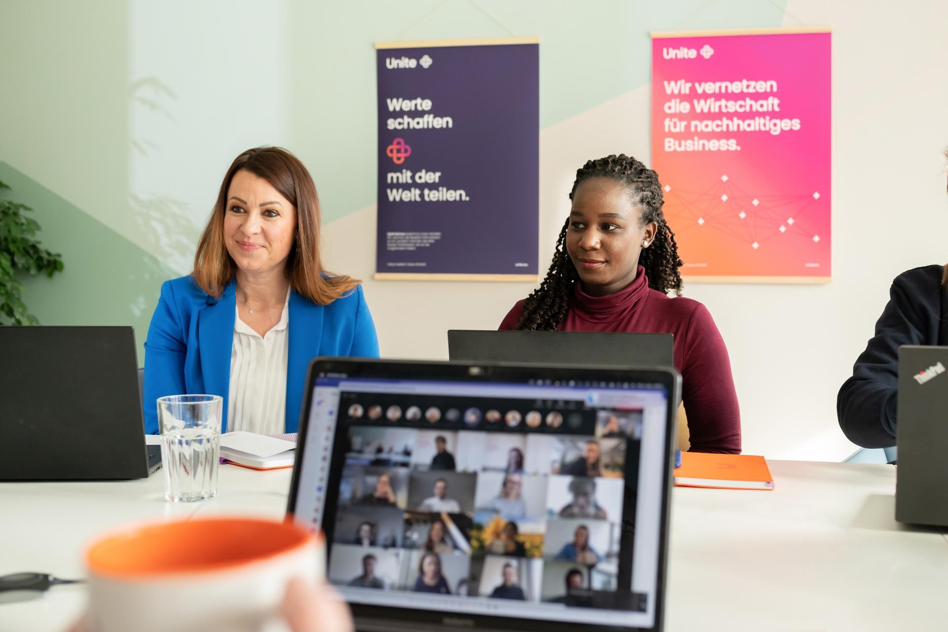 Unitees engaged in a dialogue at work