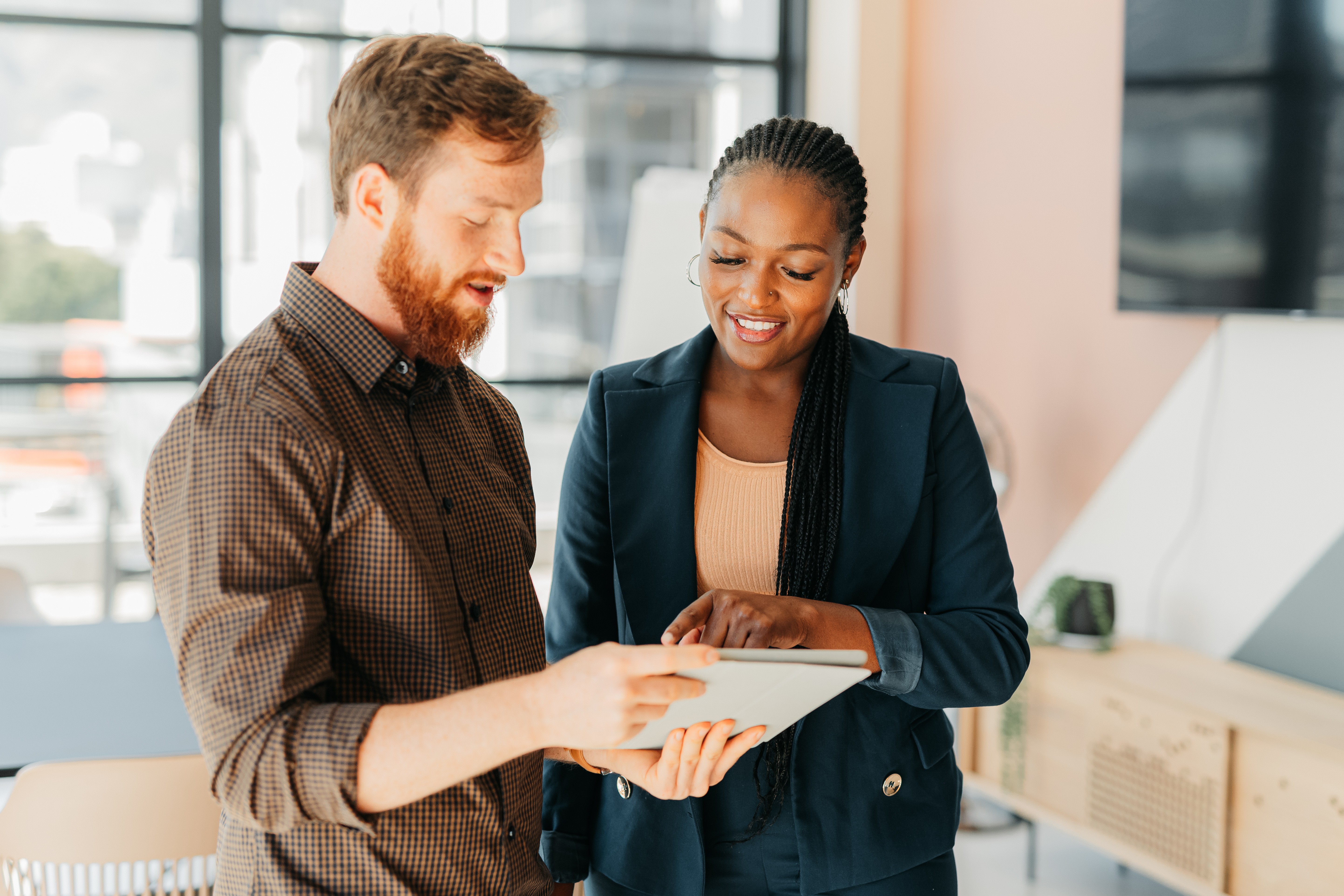 Procurement colleagues in conversation